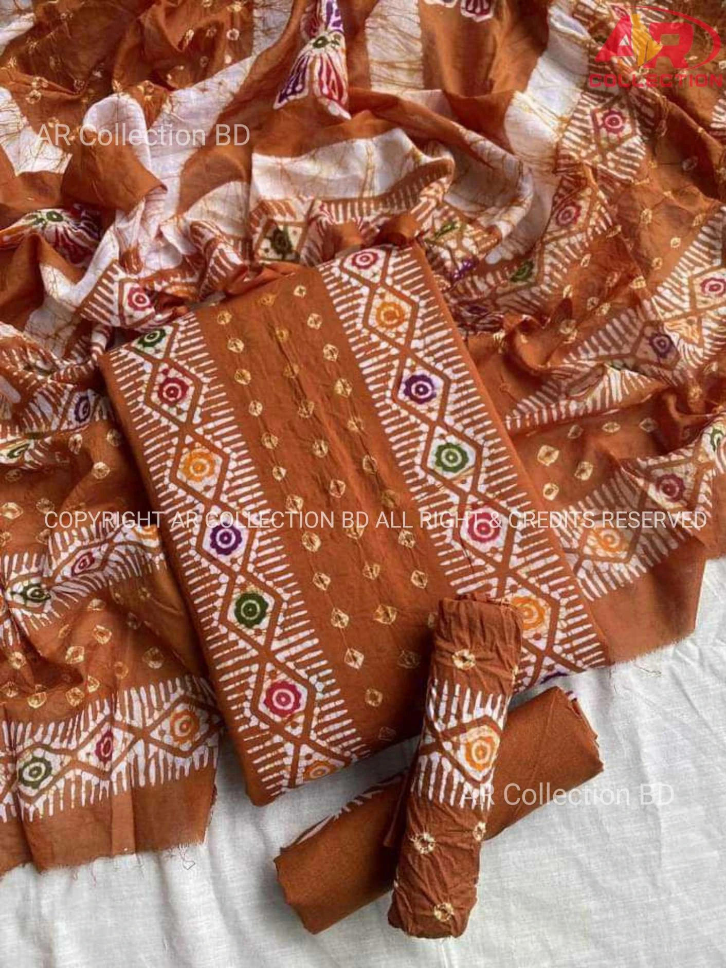 মোমটুলি বাটিক থ্রি পিস শিলাই ছাড়া নতুন ডিজাইন